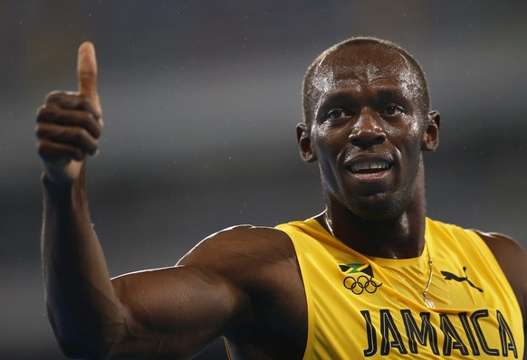 epa05498392 Usain Bolt of Jamaica celebrates after winning the men&#039;s 200m final of the Rio 2016 Olympic Games Athletics, Track and Field events at the Olympic Stadium in Rio de Janeiro, Brazil, 1 ...