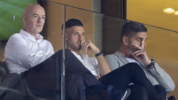 epa10094335 Heliane Canepa, Board of Directors of FC Zurich, FIFA President Gianni Infantino, Zurich&#039;s player Blerim Dzemaili and former Swiss goalkeeper Pascal Zuberbuehler, left to right, durin ...