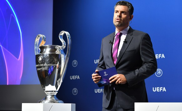 epa08538359 A handout photo made available by UEFA shows presenter Pedro Pinto during the UEFA Champions League 2019/20 quarter-final, semi-final and sinal draw at the UEFA headquarters, The House of  ...