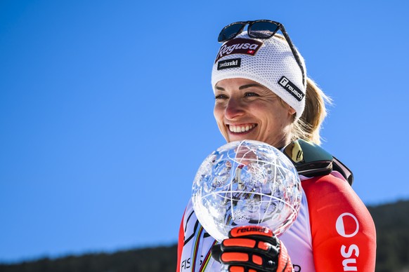 Lara Gut-Behrami of Switzerland winner of the women&#039;s super-g overall leader crystal globe trophy celebrates in the finish area at the FIS Alpine Skiing World Cup finals in El Tarter, Andorra, Th ...