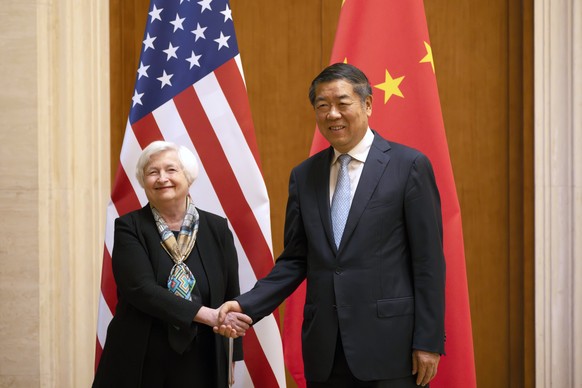 Treasury Secretary Janet Yellen, left, shakes hands with Chinese Vice Premier He Lifeng during a meeting at the Diaoyutai State Guesthouse in Beijing, China, Saturday, July 8, 2023. (AP Photo/Mark Sch ...