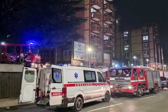 A rescue cars are parked in front of a nursing home after a fire in Tuzla, Bosnia, Tuesday, Nov. 4, 2025. (AP Photo)
Bosnia Nursing Home Fire