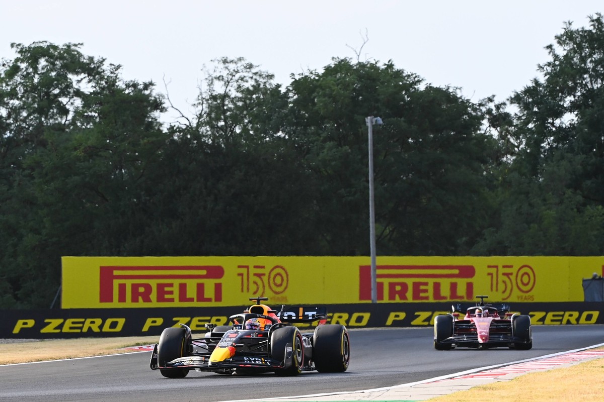 Formula 1 2022: Hungarian GP HUNGARORING, HUNGARY - JULY 29: Max Verstappen, Red Bull Racing RB18, leads Charles Leclerc, Ferrari F1-75 during the Hungarian GP at Hungaroring on Friday July 29, 2022 i ...