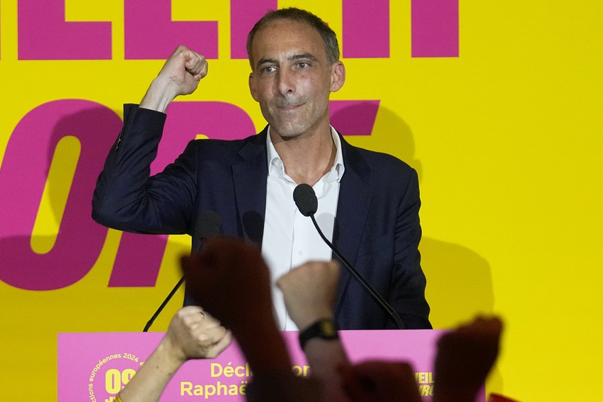 French Socialist Party lead candidate Raphael Glucksmann clenches his fist at the election night headquarters, Sunday, June 9, 2024 in Paris. First projected results from France put far-right National ...