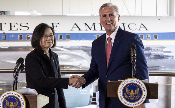 epa10560567 U.S. House Speaker Kevin McCarthy (R) and Taiwanese President Tsai Ing-wen shake hands after a press conference following a bilateral meeting at the Ronald Reagan Presidential Libr...