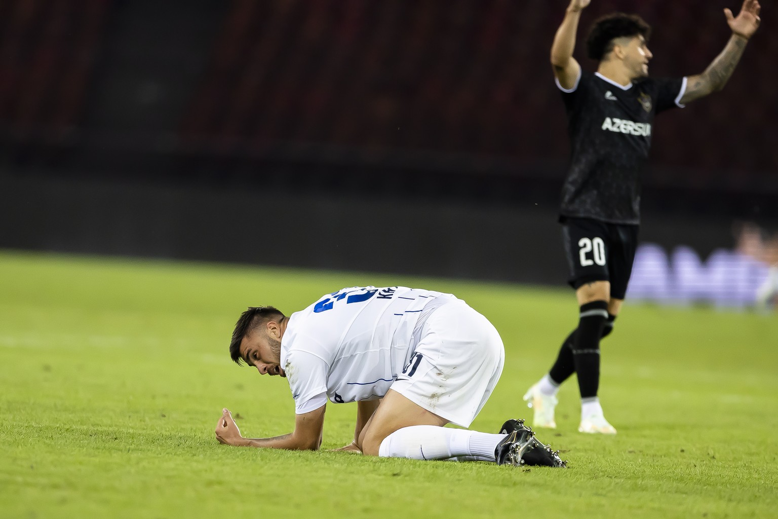 epa10094497 FC Zurich&#039;s Mirlind Kryeziu, left, reacts next to Qarabag FK&#039;s Kady, right, after the UEFA Champions League qualifying second round, second leg soccer match between Switzerland&# ...