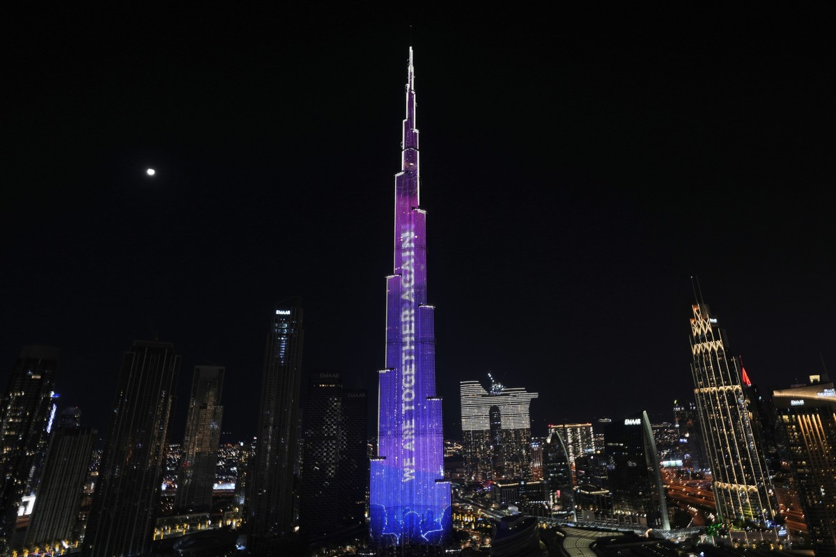 The Burj Khalifa, the world's tallest building, is illuminated during New Year's Eve celebrations in Dubai, United Arab Emirates, Sunday, Jan. 1, 2023. (AP Photo/Kamran Jebreili)