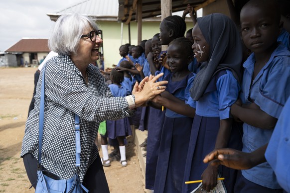 Swiss Federal Councillor Elisabeth Baume-Schneider, Head of the FDHA, says goodbye to children after a visit to the school at the Gurku Interfaith Internally Displaced Persons (IDP) Camp, in Gurku, Ni ...