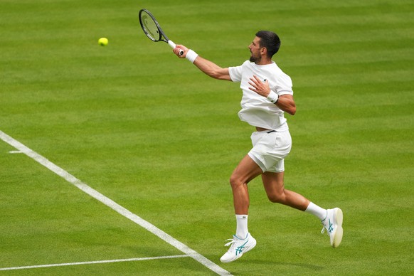 Novak Djokovic of Serbia plays a shot during a training session at the All England Lawn Tennis and Croquet Club, ahead of the Wimbledon Championships in London, Thursday, June 25, 2026. (AP Photo/Kirs ...