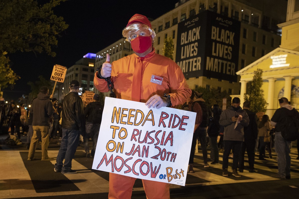 epa08797276 A man wears a costume depicting US President Donald J. Trump at Black Lives Matter Plaza in Washington, DC, USA, 03 November 2020. Americans vote on Election Day to choose between re-elect ...