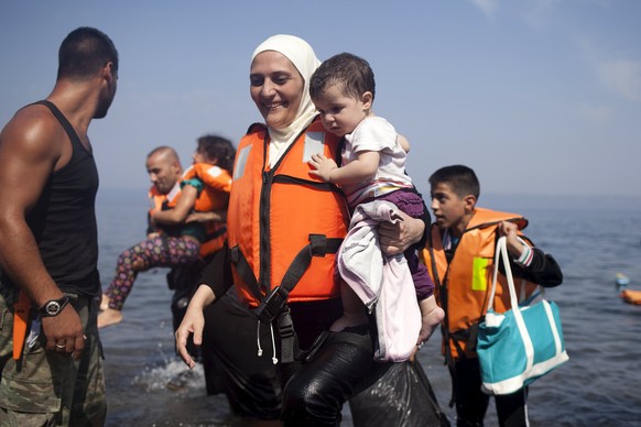 Syrische Flüchtlinge kommen auf der griechischen Ägäis-Insel Lesbos an.&nbsp;