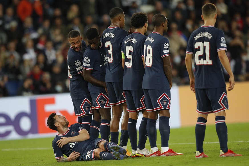 epa09494452 Paris Saint Germain&#039;s Lionel Messi (down) in action during the UEFA Champions League group A soccer match between PSG and Manchester City at the Parc des Princes stadium in Paris, Fra ...