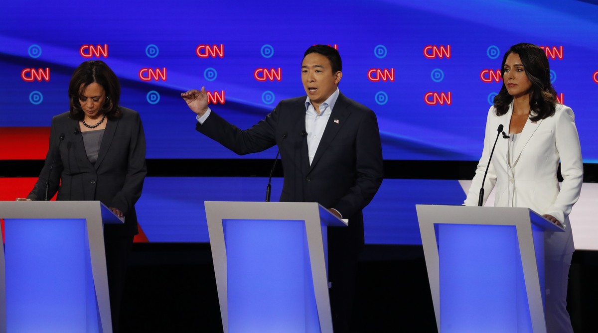 From left, Sen. Kamala Harris, D-Calif., Andrew Yang and Rep. Tulsi Gabbard, D-Hawaii, participate in the second of two Democratic presidential primary debates hosted by CNN Wednesday, July 31, 2019,  ...