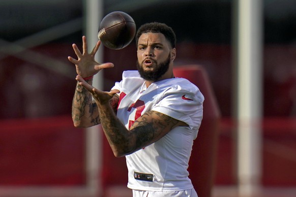 Tampa Bay Buccaneers wide receiver Mike Evans (13) makes a catch during an NFL football practice Tuesday, July 27, 2021, in Tampa, Fla. (AP Photo/Chris O&#039;Meara)
Mike Evans