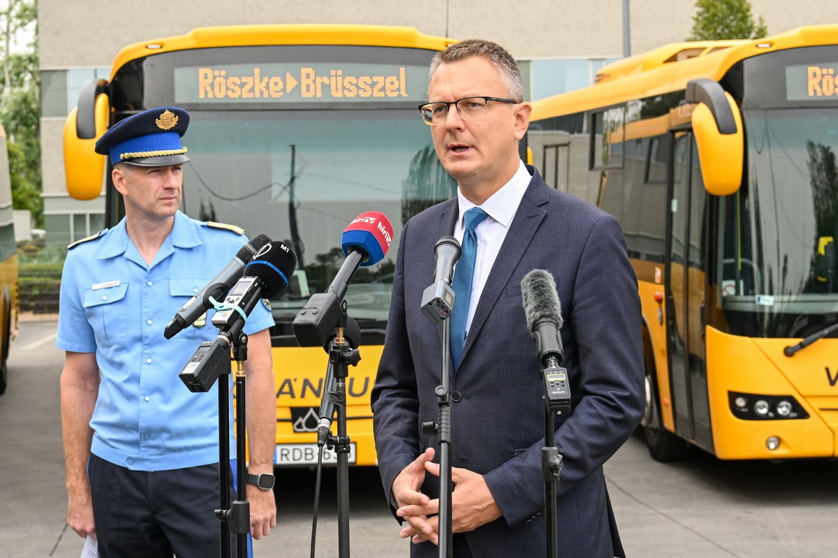 epa11598111 Picture made available on 11 September 2024 of Parliamentary Secretary of the Interior Ministry Bence Retvari (R) and National Deputy Chief of Police Janos Kuczik holding a press conferenc ...