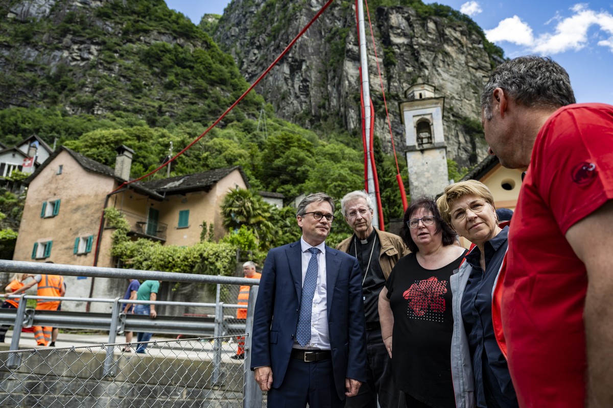 Swiss Federal President Viola Amherd, 2nd right, visits regions hit by bad weather, with President of the Government of Ticino Christian Vitta, Bishop Alain de Raemy, Mayor of Cevio Wanda Dado and May ...
