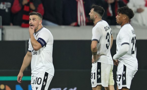 epa12403277 Xherdan Shaqiri of Basel (L) and teammates look disappointed after losing the UEFA Europa League league phase match between SC Freiburg and FC Basel, in Freiburg, Germany, 24 September 202 ...