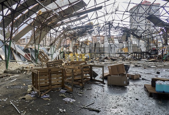 epa12520750 The site of a Russian drone strike in Kharkiv, northeastern Ukraine, 12 November 2025, amid the ongoing Russian invasion. At least 3 people were injured after Russian drone strikes on the  ...