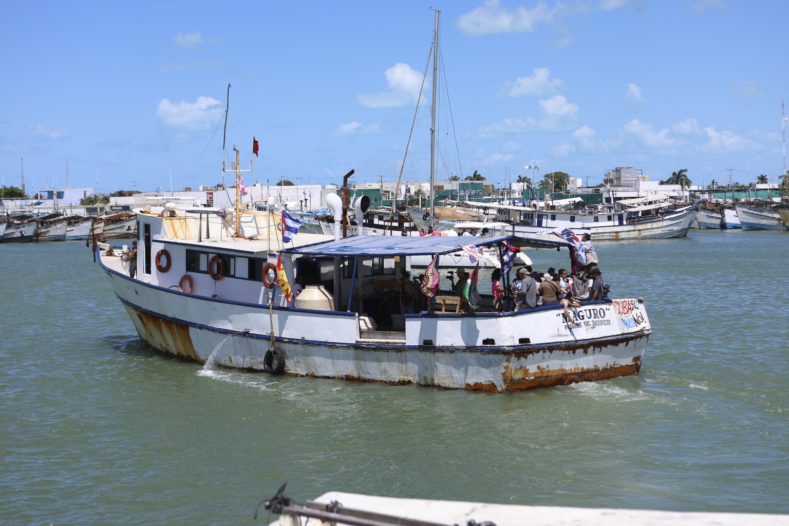 epa12837679 The ship 'Maguro', part of the Mexican delegation of the 'Nuestra America' convoy, sets sail for Cuba loaded with humanitarian aid from the port of Yucalpeten in Yucata ...