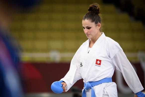 Elena Quirici of Switzerland reacts after the women&#039;s karate kumite +61kg fight against Li Gong of China at the 2020 Tokyo Summer Olympics in Tokyo, Japan, on Saturday, August 07, 2021. (KEYSTONE ...