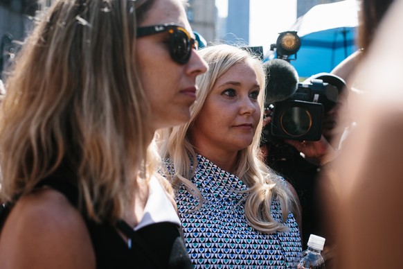 epa07798190 Some of deceased financier Jeffrey Epstein's alleged victims, including Virginia Roberts Giuffre (C) exit the United States Federal Courthouse in New York, New York, USA, 27 August 20 ...