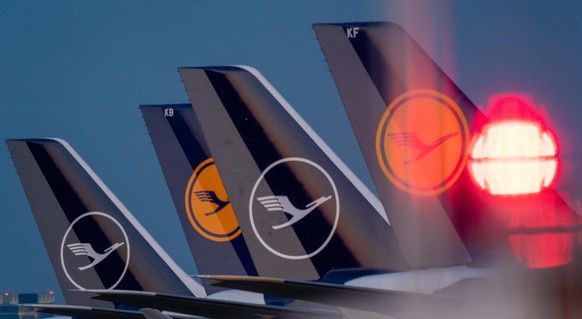 epa08447972 (FILE) - Lufthansa aircraft are parked on the North West runway at the Fraport International airport in Frankfurt/Main, Germany, 23 March 2020 (reissued 27 May 2020). According to media re ...