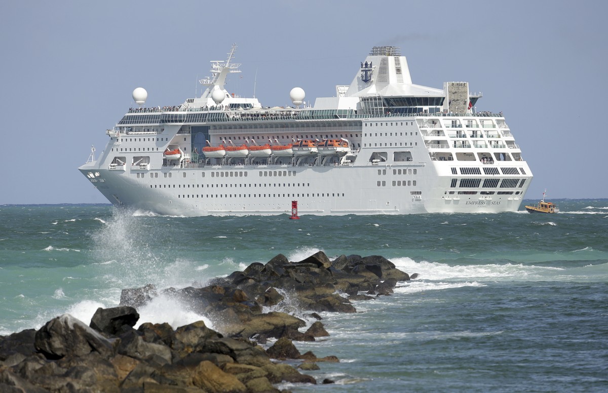 FILE - In this June 20, 2016 file photo, the Royal Caribbean cruise ship Empress of the Seas heads out of PortMiami, in Miami Beach, Fla. Royal Caribbean says it's now canceled eight cruises out  ...