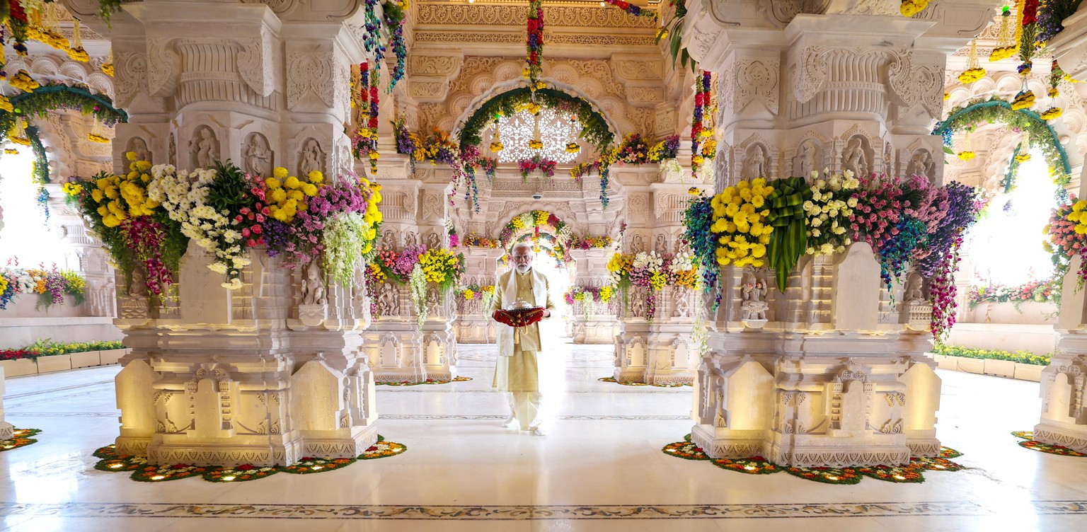 epa11096245 A handout photo made available by India&#039;s Press Information Bureau (PIB) shows Indian Prime Minister Narendra Modi attending the inauguration ceremony of the Ram Mandir temple in Ayod ...