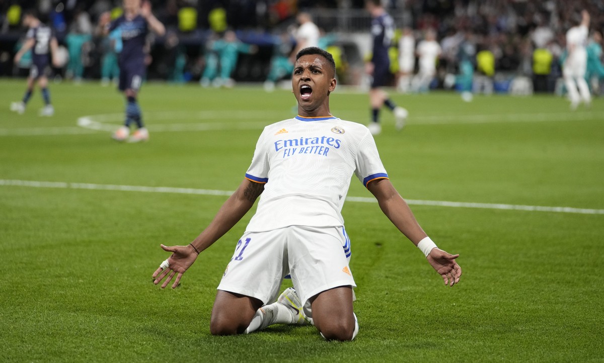 Real Madrid's Rodrygo celebrates his side's second goal during the Champions League semi final, second leg, soccer match between Real Madrid and Manchester City at the Santiago Bernabeu stad ...