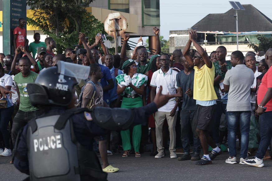 epa10986885 Supporters of opposition Unity party(UP), of president-elect, Joseph Nyumah Boakai, celebrate his victory, over incumbent president George Weah, ruling Coalition for Democratic Change(CDC) ...