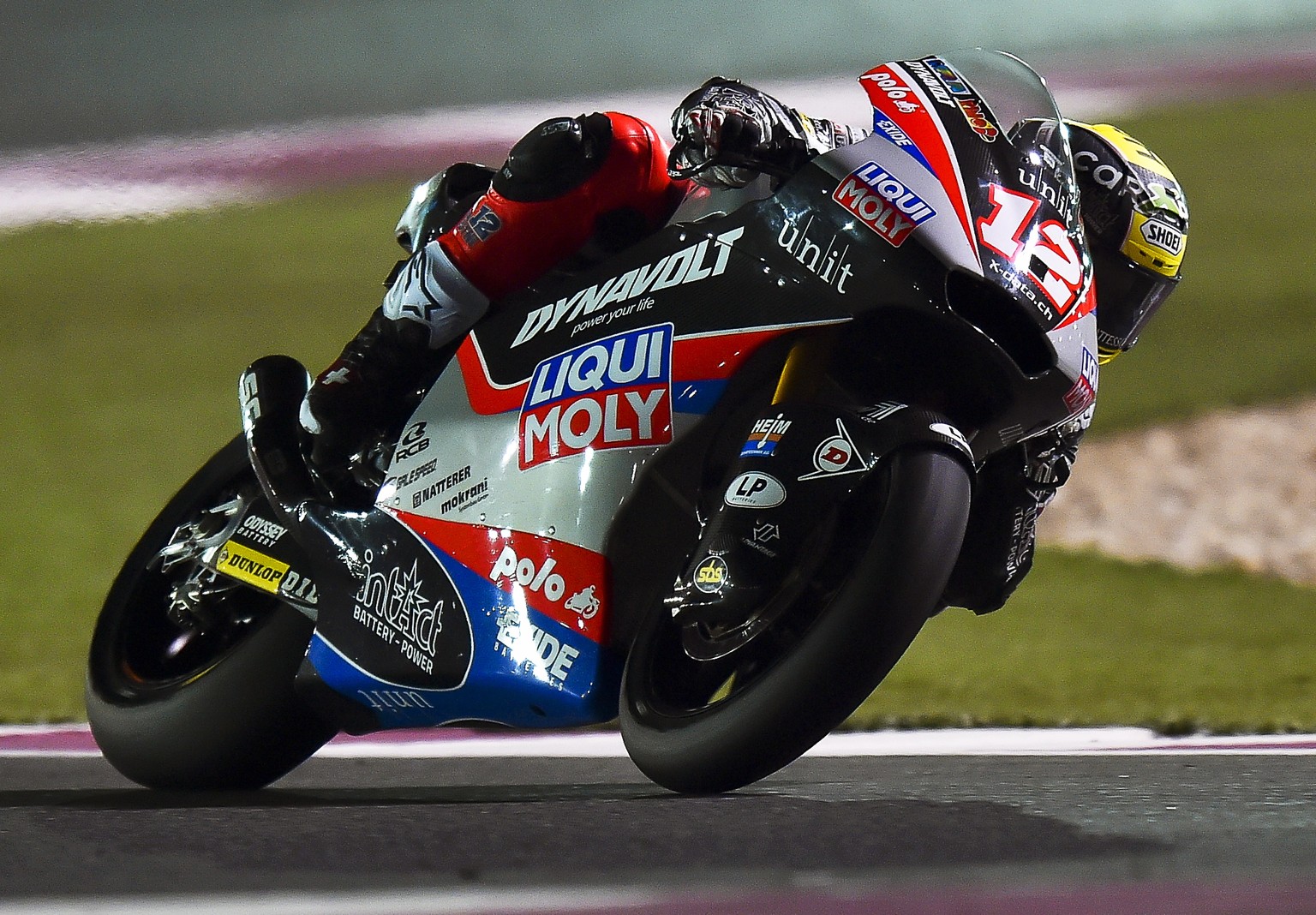 epa08278997 Swiss Moto2 rider Thomas Luthi of the Liqui Moly Intact GP team in action during the Moto2 race at the Motorcycling Grand Prix of Qatar at Losail International Circuit in Doha, Qatar, 08 M ...