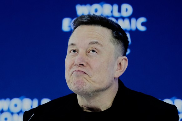 Elon Musk attends the Annual Meeting of the World Economic Forum in Davos, Switzerland, Thursday, Jan. 22, 2026. (AP Photo/Markus Schreiber)
APTOPIX Switzerland Davos
