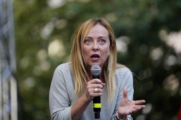 Right-wing party Brothers of Italy&#039;s leader Giorgia Meloni addresses a rally as she starts her political campaign ahead of Sept. 25 general elections, in Ancona, Italy, Tuesday, Aug. 23, 2022. (A ...