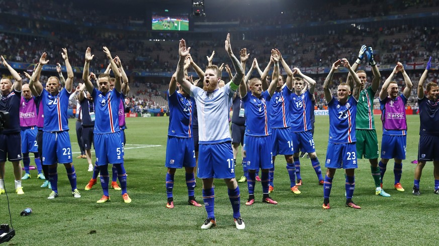 Football Soccer - England v Iceland - EURO 2016 - Round of 16 - Stade de Nice, Nice, France - 27/6/16
Iceland players celebrate after the game
REUTERS/Michael Dalder
Livepic