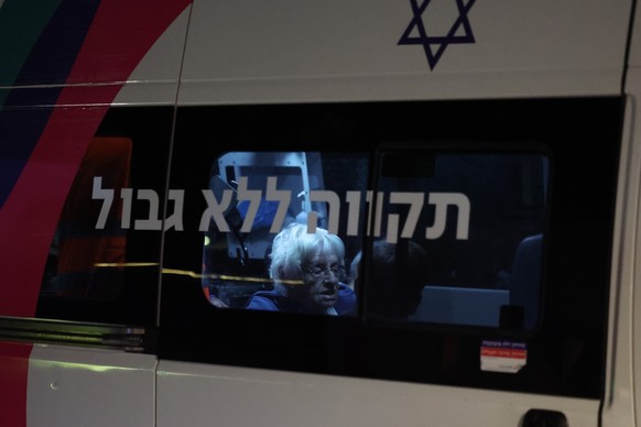 epa11000272 Israeli hostage Ditza Heiman is seen in an ambulance after getting out from an Israeli army helicopter at Sheba Medical Center in Tel HaShomer neighborhood in Ramat Gan, Israell 28 Novembe ...