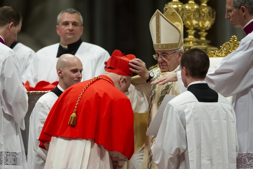 New Cardinal Anders Arborelius receives the red three-cornered biretta hat from Pope Francis during the Ordinary Public Consistory, Vatican City, ITALY-28-06-2017 Journalistic use only.