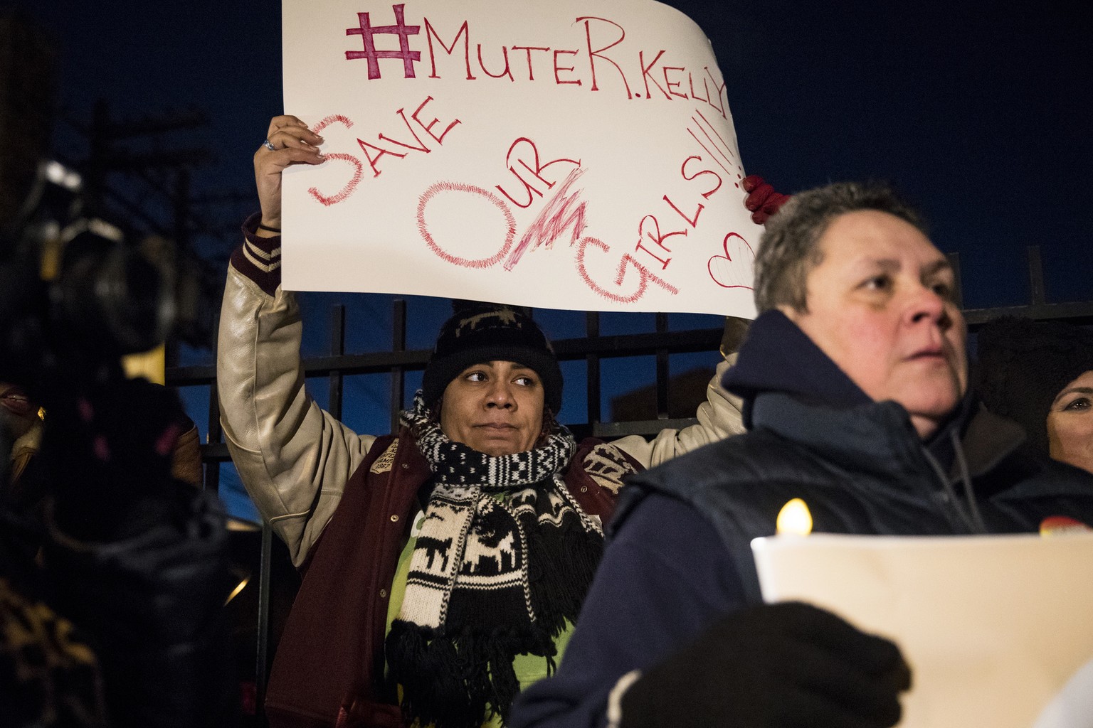 #MuteRKelly supporters protest outside R. Kelly&#039;s studio Wednesday night, Jan. 9, 2019, in Chicago. Lifetime&#039;s &quot;Surviving R. Kelly&quot; series which aired earlier this month, looks at  ...