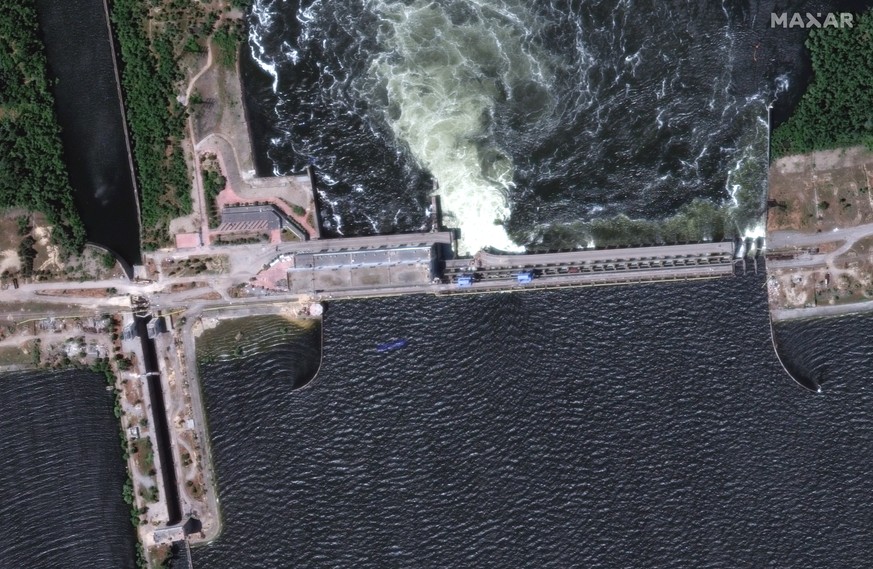 epa10676607 A handout satellite image made available by Maxar Technologies shows a closer view of the Nova Kakhovka dam and hydroelectric plant before its collapse Kherson region, southern Ukraine, 05 ...