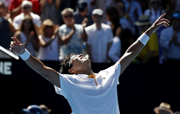 South Korea&#039;s Chung Hyeon celebrates after defeating United States&#039; Tennys Sandgren in their quarterfinal at the Australian Open tennis championships in Melbourne, Australia, Wednesday, Jan. ...