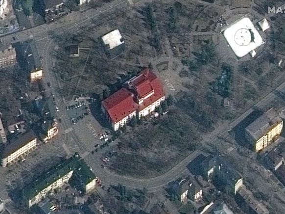 This satellite image provided by Maxar Technologies shows the Mariupol Drama Theater in Mariupol, Ukraine on Monday, March 14, 2022. Ukrainian officials say Russian forces destroyed the theater in the ...