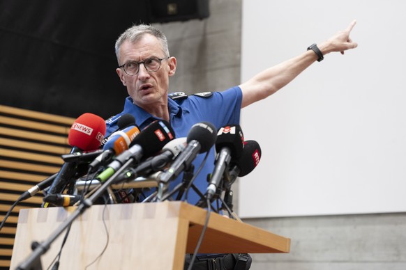 epa13200938 Colonel Michael Leupold, Police Commander, speaks a press conference following a shooting at a rave event at the Schachen horse racing track in Aarau, Switzerland, 30 August 2026. One pers ...