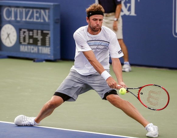 epa04864297 Mardy Fish of the US in action against Dudi Sela of Israel during a first round match at the BB&amp;T Atlanta Open tennis tournament at Atlantic Station in Atlanta, Georgia, USA, 28 July 2 ...