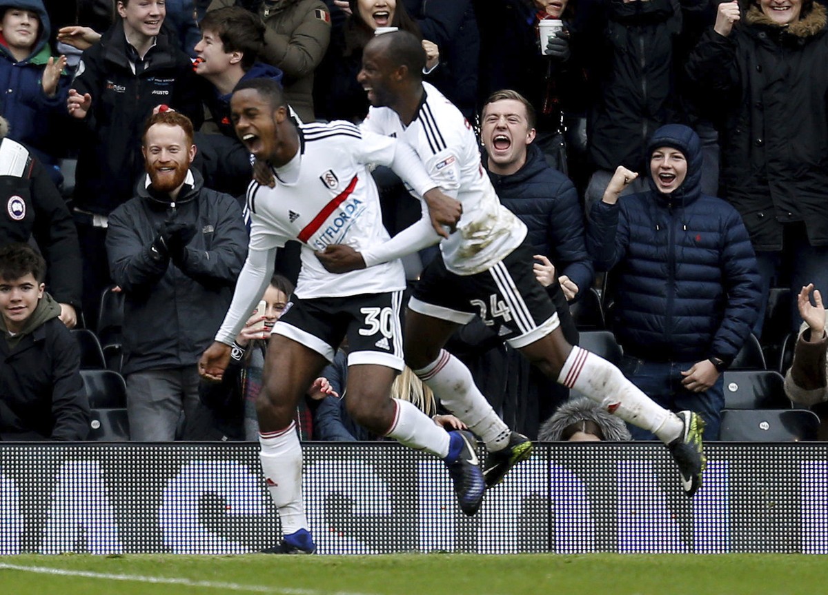 Fulham's Ryan Sessegnon celebrates scoring his side's third goal of the game with Sone Aluko, right, during the English FA Cup, Fourth Round match, Fulham vs Hull City at Craven Cottage, Lon ...