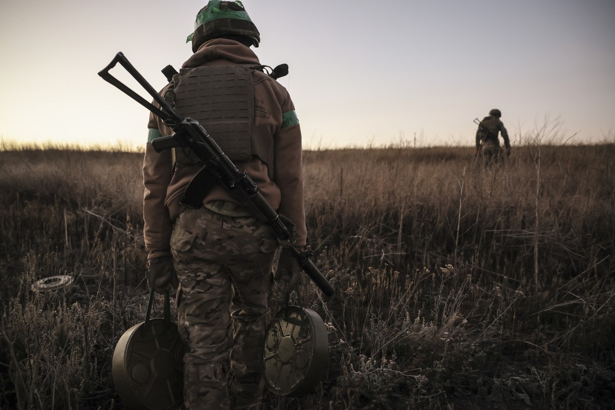 epa11696166 A handout photo made available by the press service of the Ukrainian Armed Forces's 24th Mechanized Brigade on 01 November 2024 shows servicemen of the 24th Mechanized Brigade named a ...
