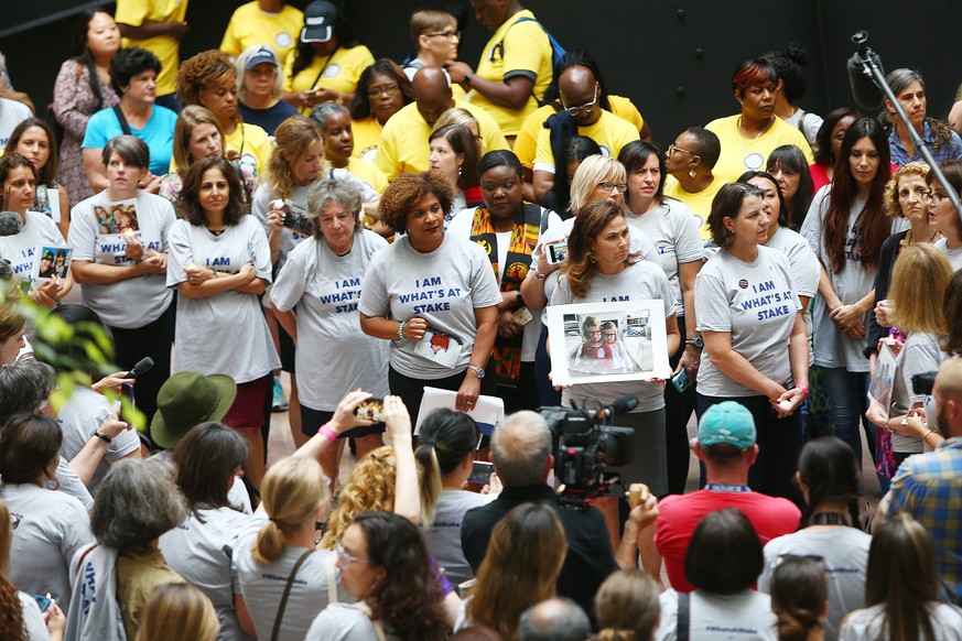 epa06996642 Protesters inside the Hart Senate Office building as Brett Kavanaugh appears before his Senate confirmation hearing to be an Associate Justice of the Supreme Court of the United States in  ...