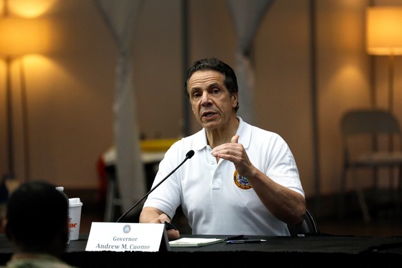 epa08327086 New York State Governor Andrew Cuomo speaks at a press conference at the Jacob Javits Convention Center in New York, New York, USA, 27 March 2020. New York City is now an epicenter of coro ...