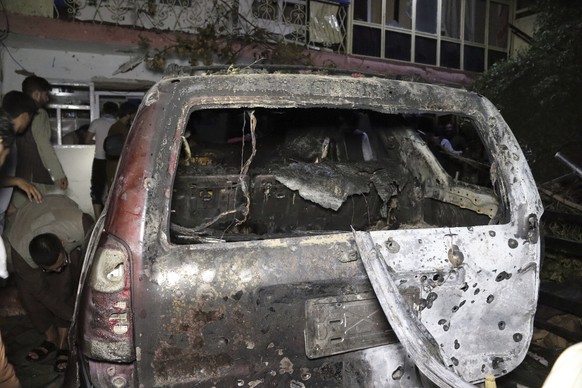 A destroyed vehicle is seen inside a house after a U.S. drone strike in Kabul, Afghanistan, Sunday, Aug. 29, 2021. A U.S. drone strike destroyed a vehicle carrying &quot;multiple suicide bombers&quot; ...