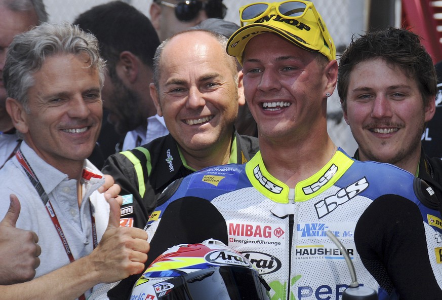 31.05.2015; Mugello; Motorrad - GP Italien 2015; Jubel des drittplazierten Dominique Aegeter (SUI), Kalex. Links aussen Teamchef Frederic Corminbeuf und Olivier Metraux (beide SUI). (Waldemar Da Rin/f ...