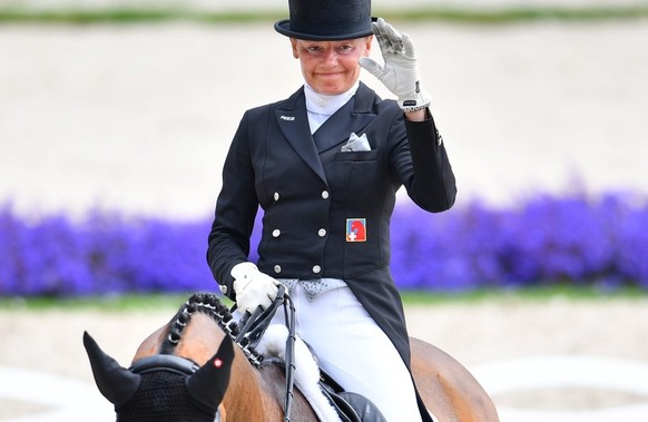 epa05427664 Swiss rider Marcela Krinke Susmelj on horse Molberg during the Grand Prix Special dressage competition at the CHIO international horse show in Aachen, Germany, 16 July 2016. EPA/Uwe Anspac ...