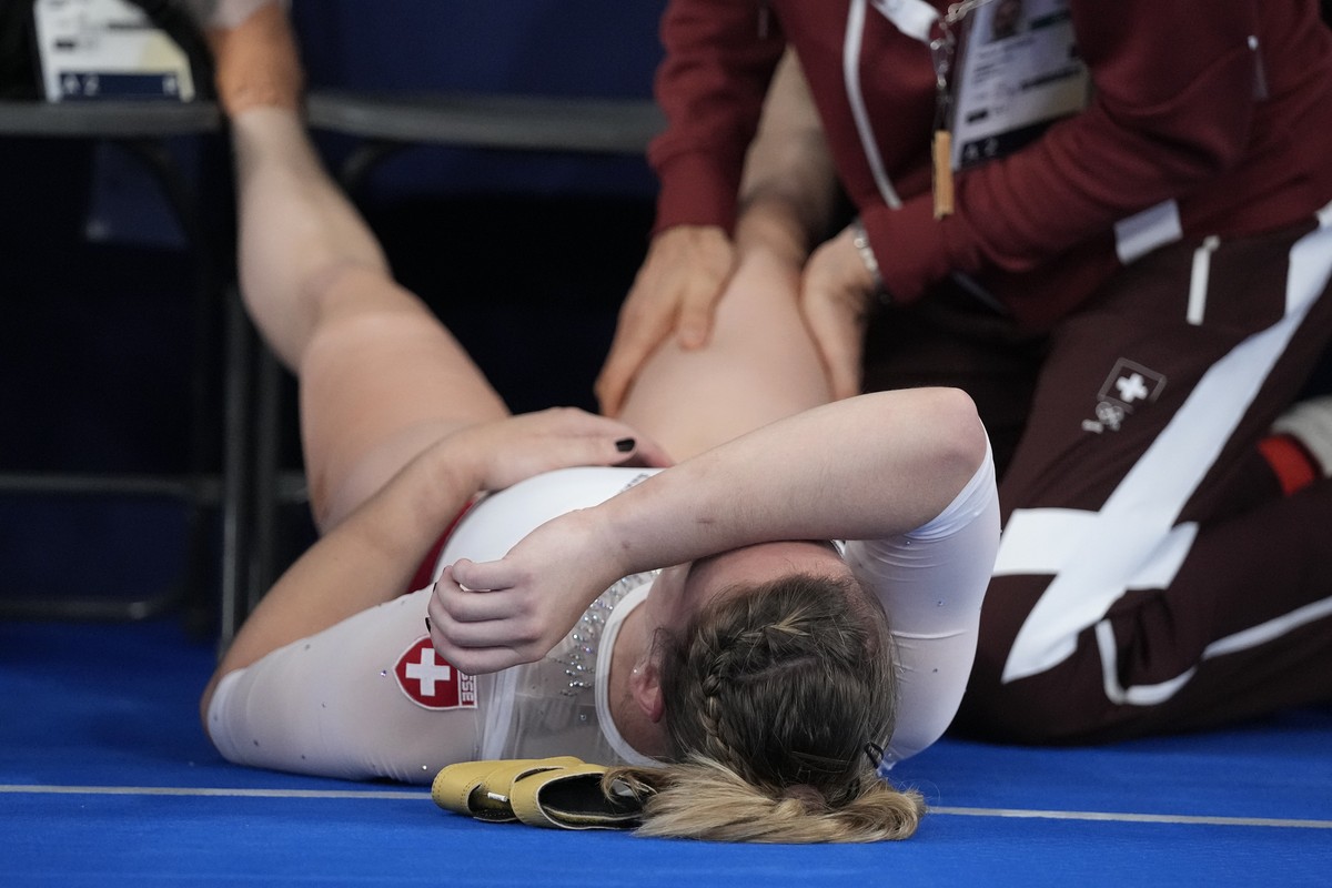 Giulia Steingruber, of Switzerland, gets a massage during the artistic gymnastics women's all-around final at the 2020 Summer Olympics, Thursday, July 29, 2021, in Tokyo. (AP Photo/Gregory Bull)